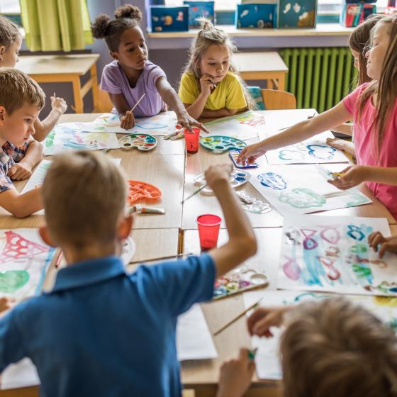 young students painting