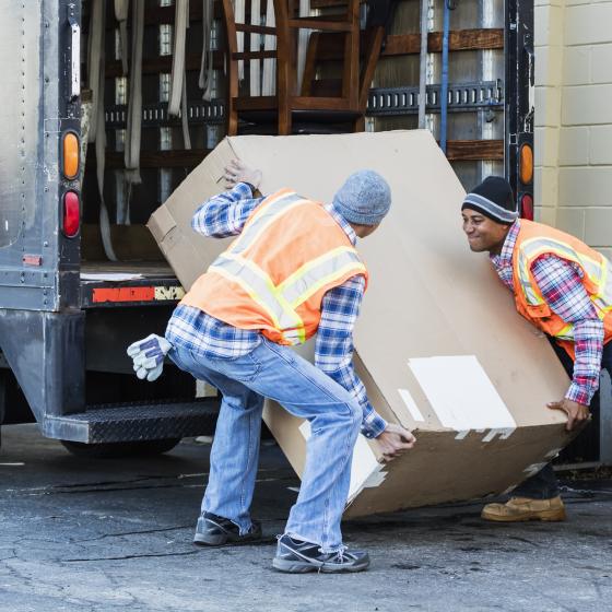 delivery men loading package