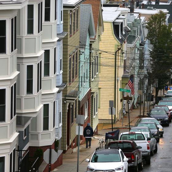 a row of crowded houses on a Boston street